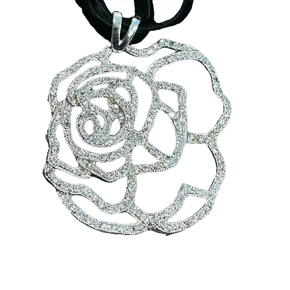 STERLING SILVER OPEN FLOWER PENDANT W MICRO PAVE STONES ON BLACK SUEDE NECKLACE